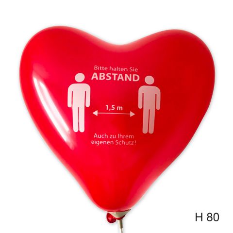 Roter heruluftballon mit dem Aufdruck "Bitte Abstand halten"