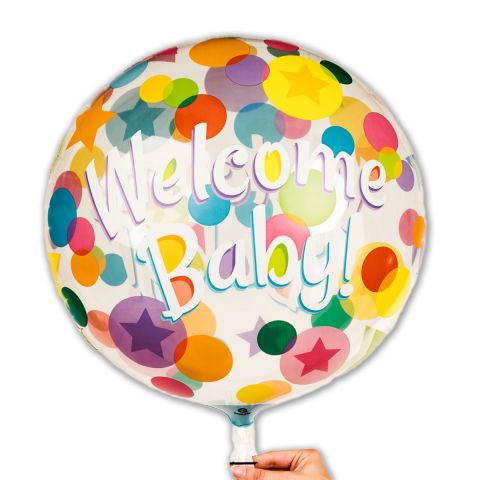 Runder, flacher Folienballon mit dem Aufdruck "Welcome Baby" und bunten Punkten.
